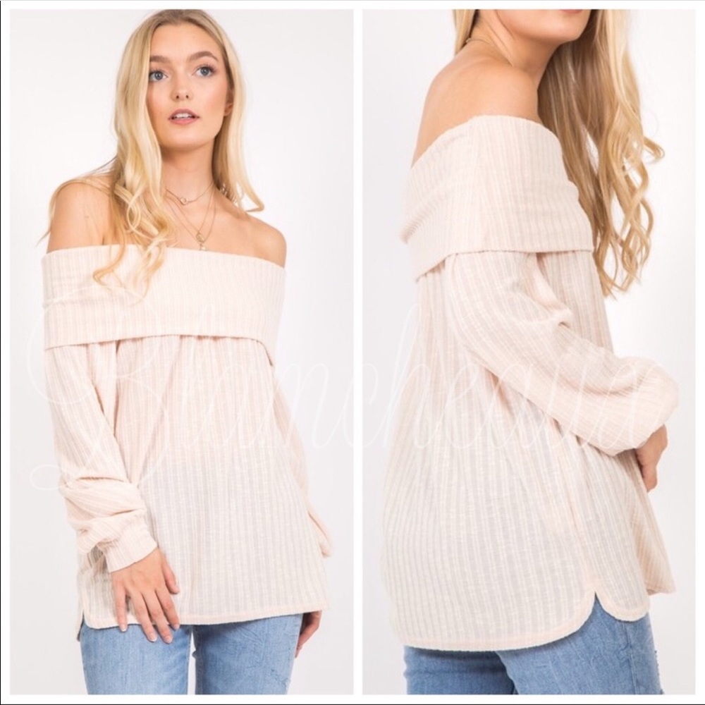 OFF THE SHOULDER SWEATER IN MEDIUM AND LARGE.